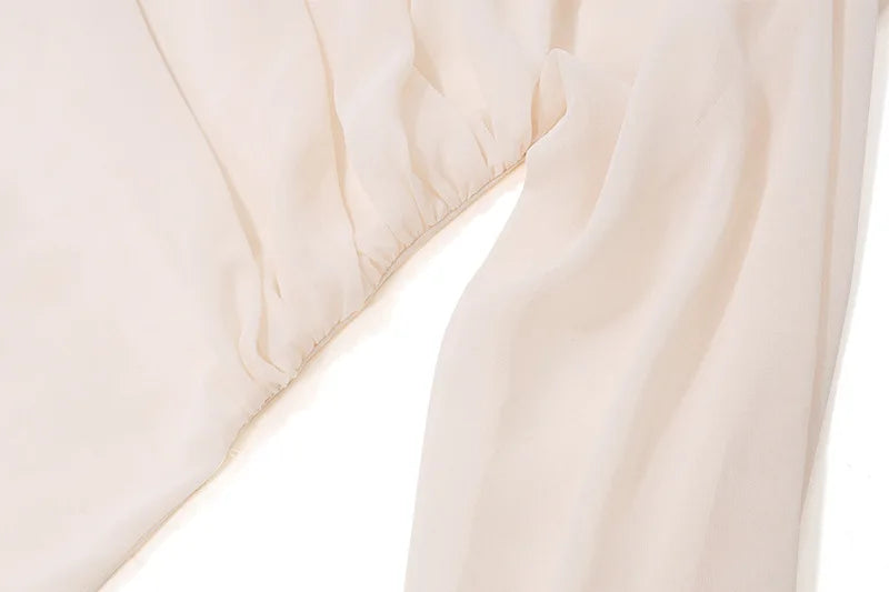 MoreThanWords™ Slope Shoulder Asymmetric Cropped Blouse – Elegant Autumn Essential